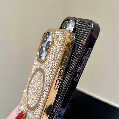 a gold iphone case with a diamond covered case