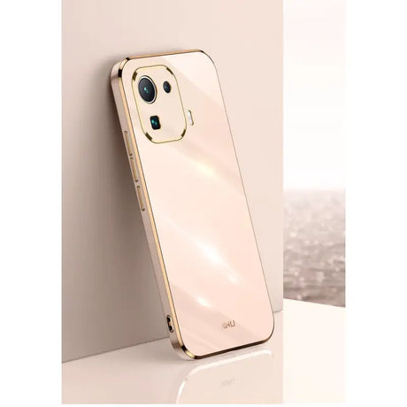 the back of a gold iphone case