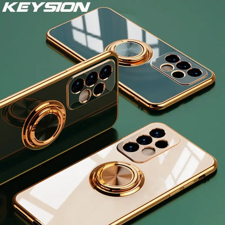 two gold iphones with a camera and a phone holder