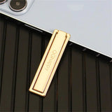 a gold metal case with a metal bar on it