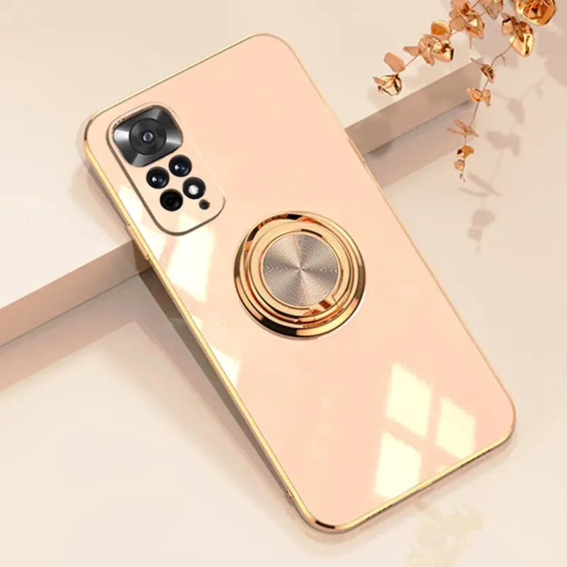 a gold phone case with a phone holder