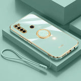 a white and gold phone case with a white cable