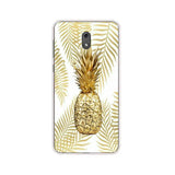 a gold pineapple phone case with a tropical print