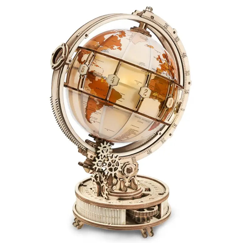 a gold and silver globe with a clock