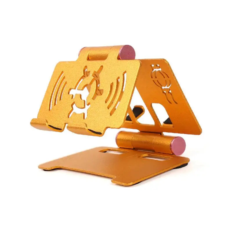 a gold metal stand with a phone holder