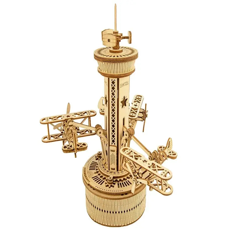 a gold plated model of a tower