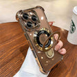 Gold-trimmed clear phone case with ring stand.