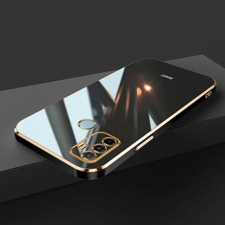 Gold-trimmed, reflective phone case.