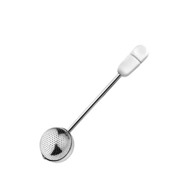 a golf ball and a golf club on a white background