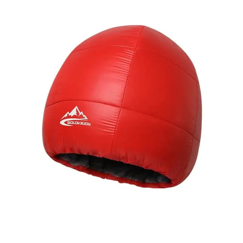 a close up of a red ball with a mountain logo on it