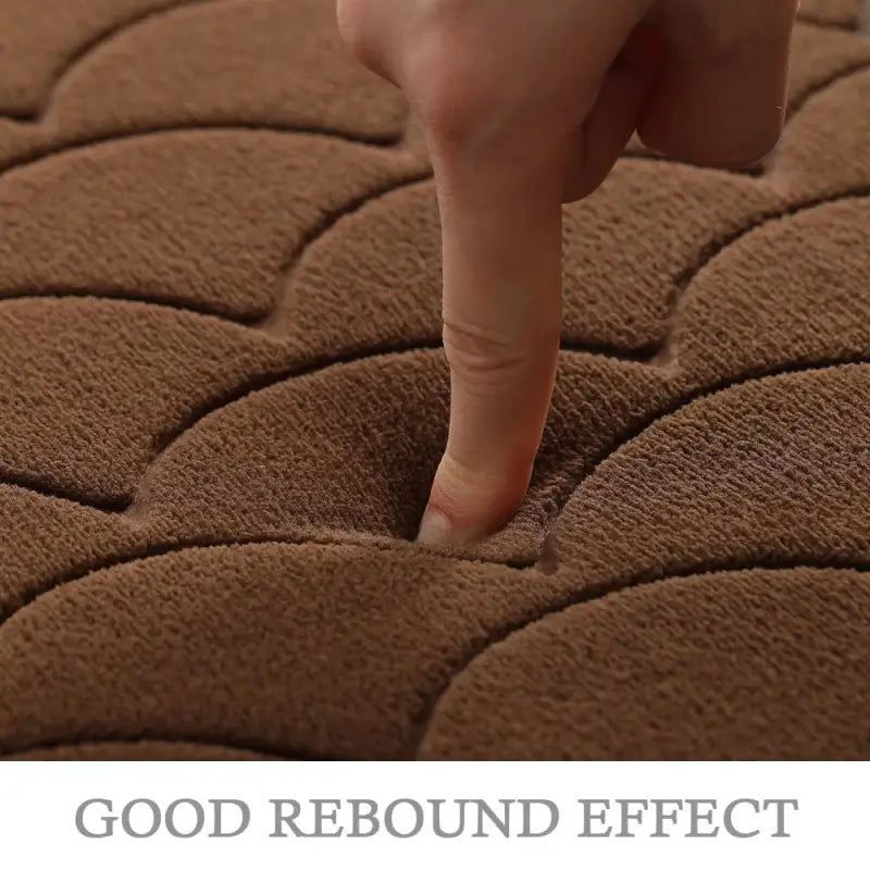 a hand touching a brown rug with the words godbound effect
