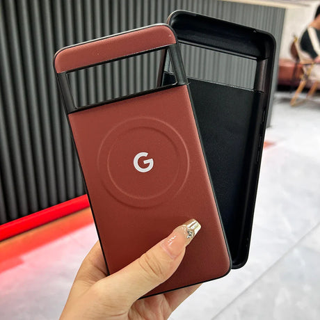 Google Pixel smartphone with a distinctive red color and G logo on the back.