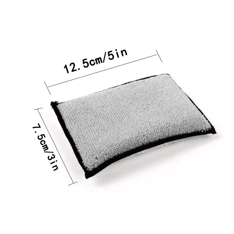 a gray and black pillow with a white background