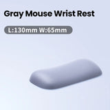 Gray ergonomic wrist rest for computer use.