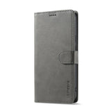 Gray faux leather wallet phone case with a magnetic clasp.