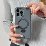 Gray iPhone case with a built-in magnetic ring holder and kickstand.