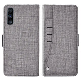 the back of a gray iphone case with a card slot