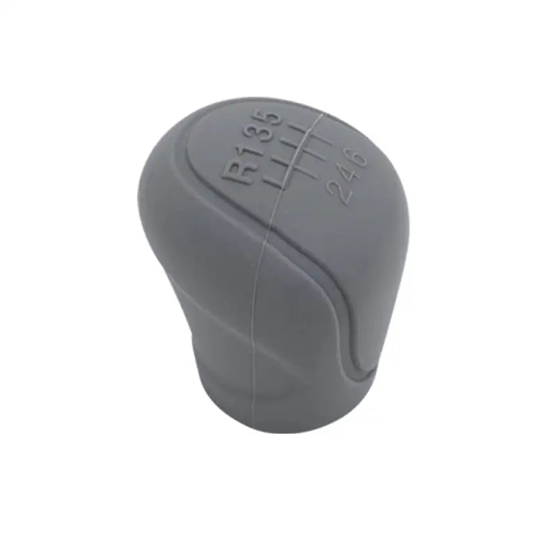 a gray plastic knob with a white background