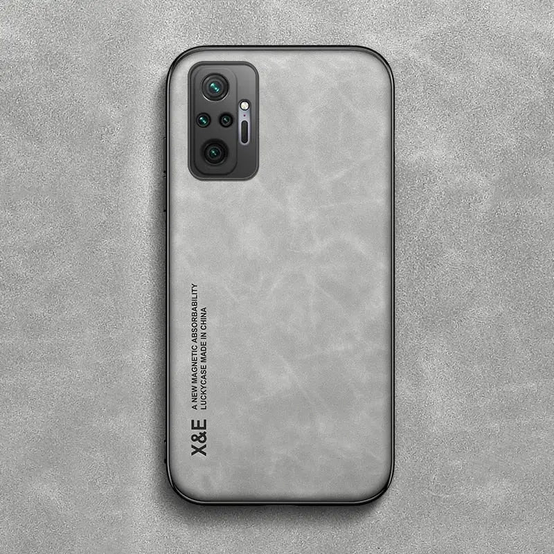 the back of a gray leather iphone case