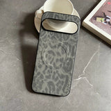 Gray leopard print phone case with a camera cutout.