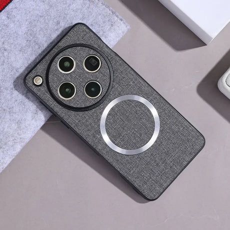 Gray phone case with camera lens circle and magnetic ring.