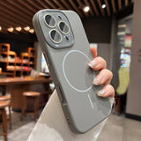 Gray phone case with camera lens protectors and MagSafe ring.