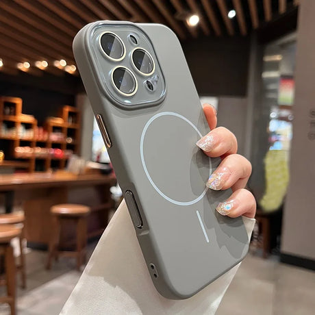 Gray phone case with camera lens protectors and MagSafe ring.