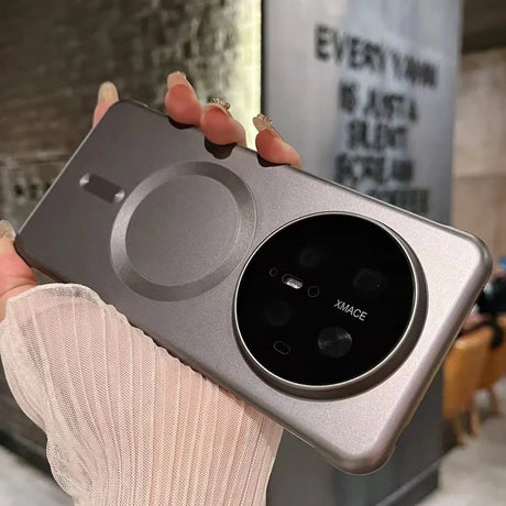Gray phone case with circular camera module.