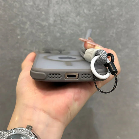 Gray phone case with lanyard.