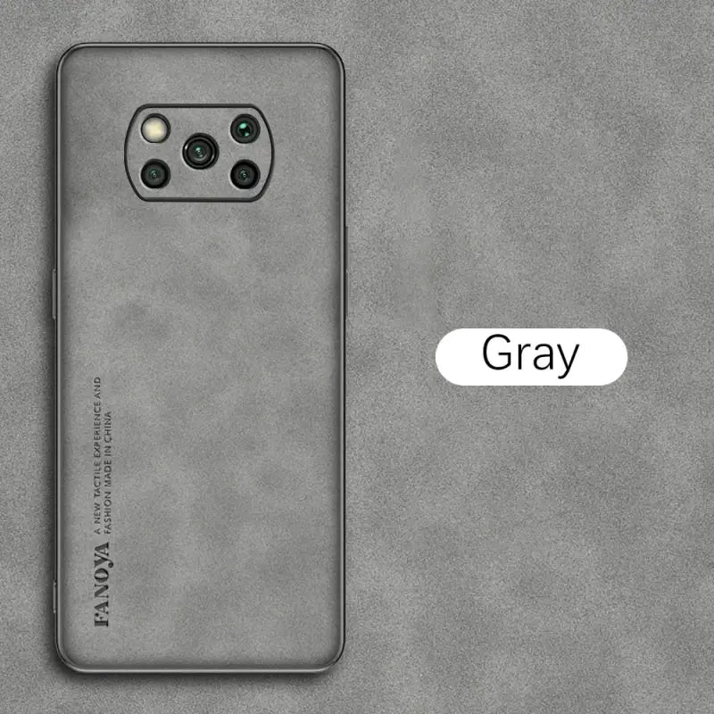 the back of a gray phone with a white text that reads gray