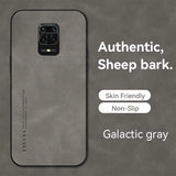 the back of a gray samsung phone case with the text, `, ’, ’, ’, ’
