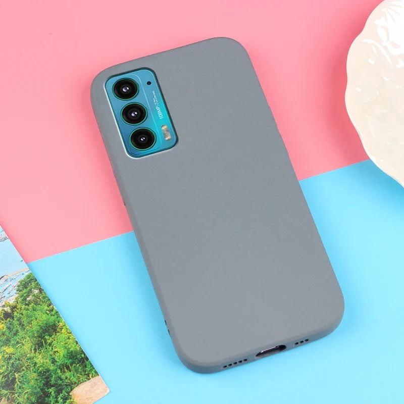 Gray smartphone case with a blue triple-camera module visible.