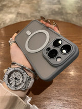 Gray smartphone case with a circular magnetic attachment and triple camera cutout.