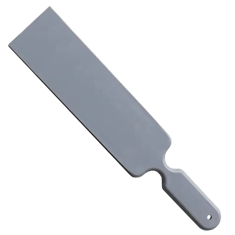 a gray spat with a handle