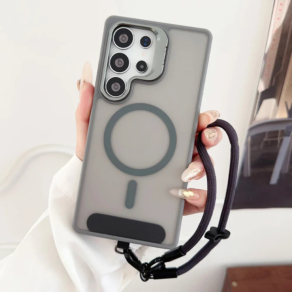 A gray translucent phone case with a visible magnetic ring and a black wrist strap.