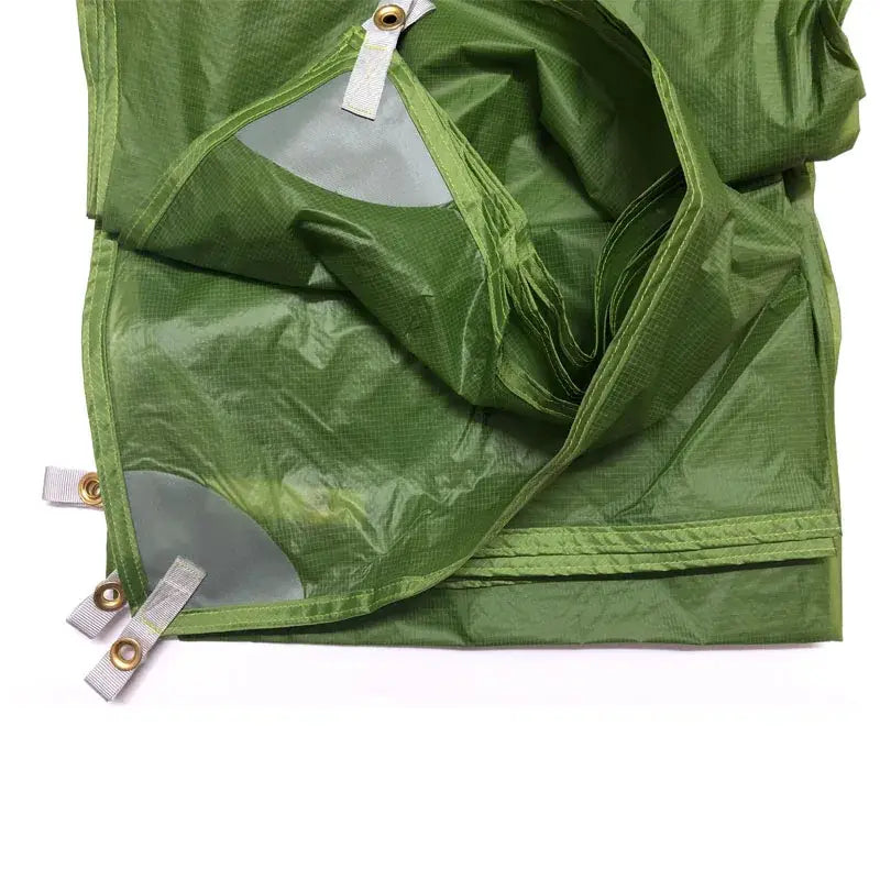 a green bag with a zipper on it