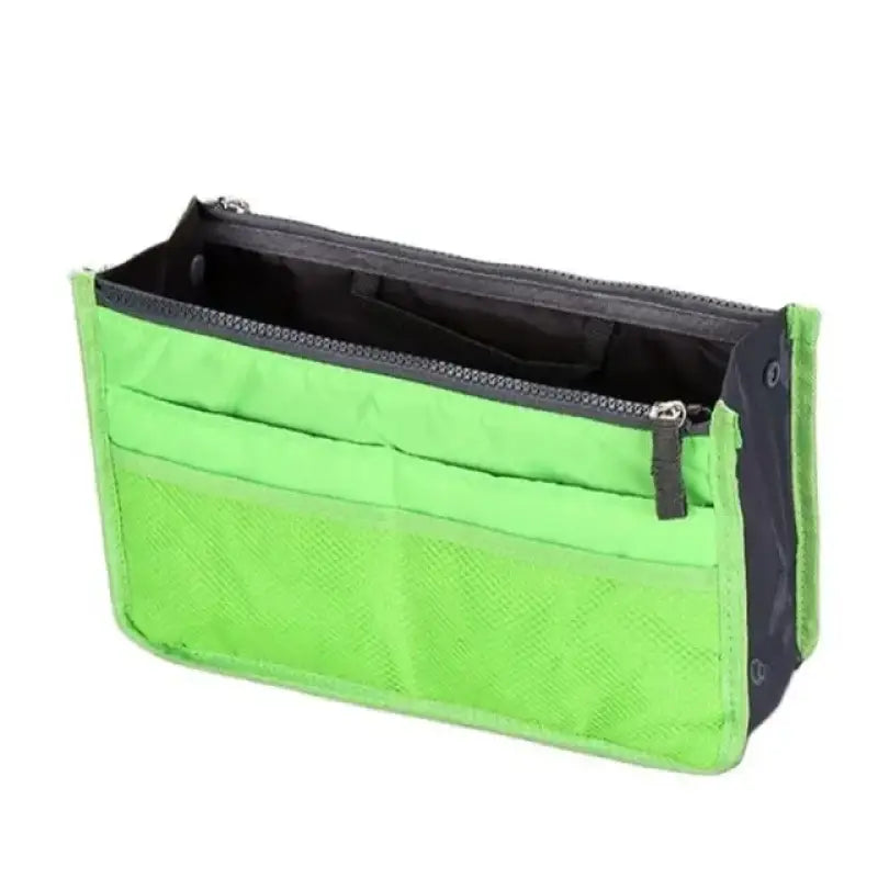 a green and black bag with a zipper