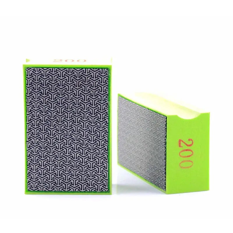 a green and black box with a pattern on it