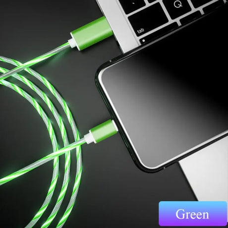 a green cable connected to a laptop