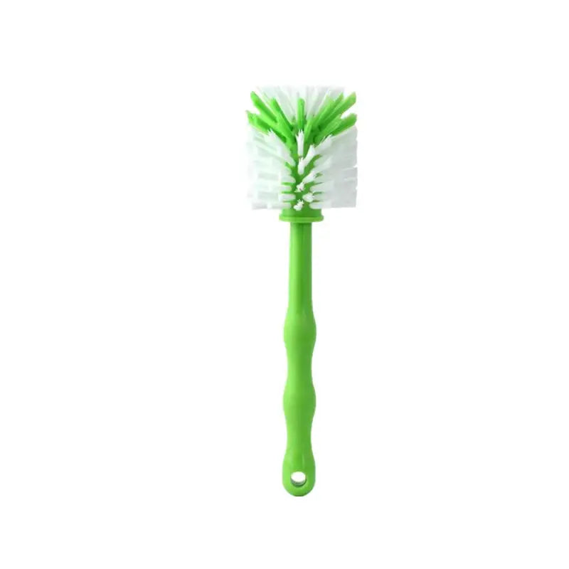 a green brush with white bristles on it