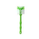 a green brush with white bristles on it