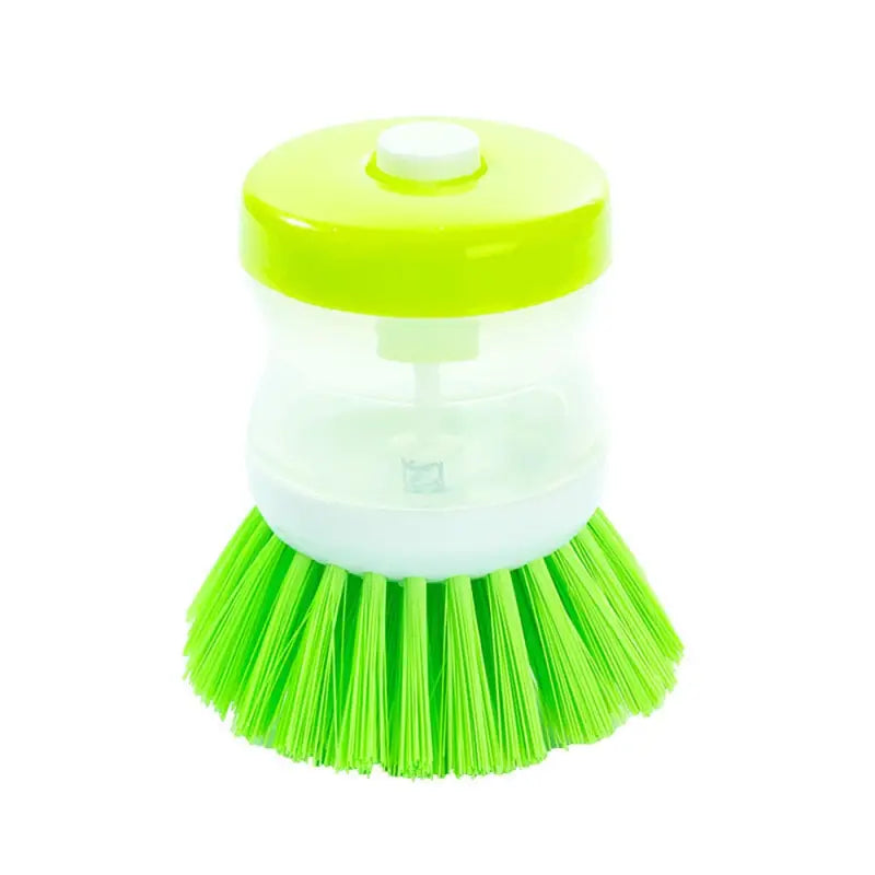 a green brush with a white handle