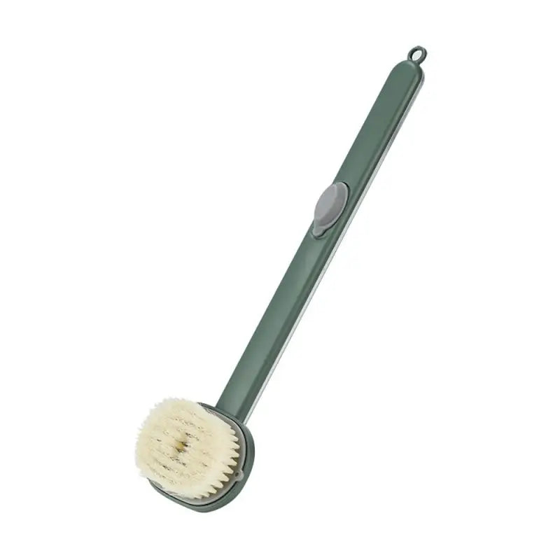 a green brush with a white br brush head