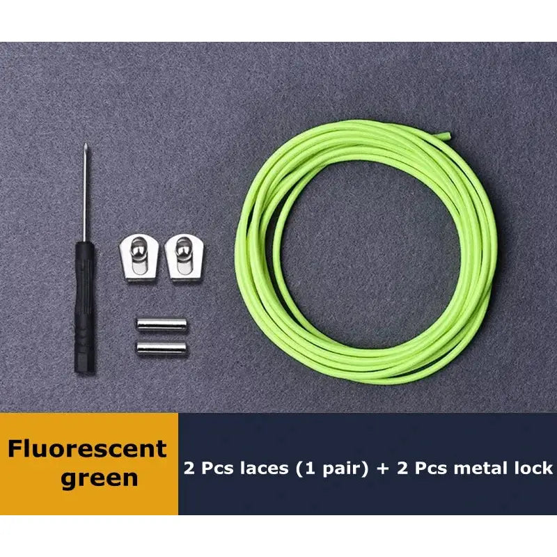 a green cable with a black and white cable