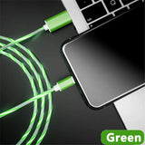 a green cable connected to a laptop