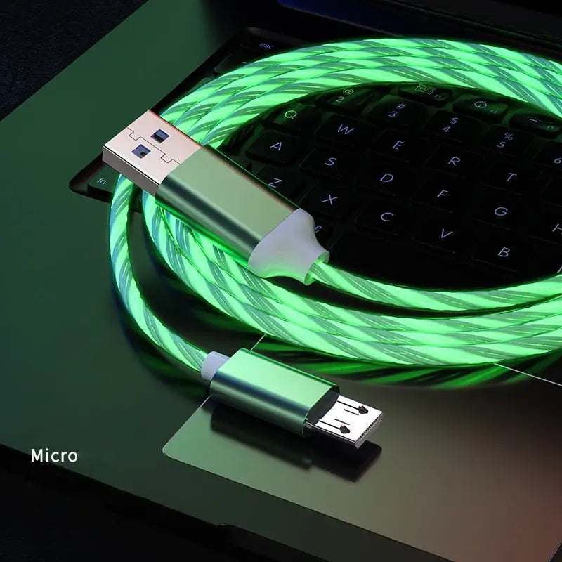 a green usb cable connected to a laptop