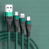 a green cable connected to a black and white cable