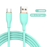 a green usb cable with a white background