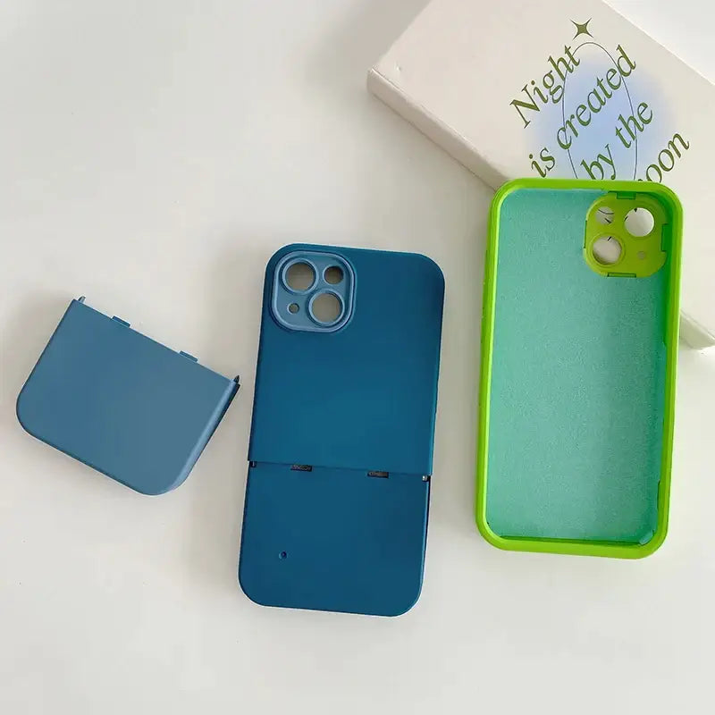 a green case with a blue phone inside