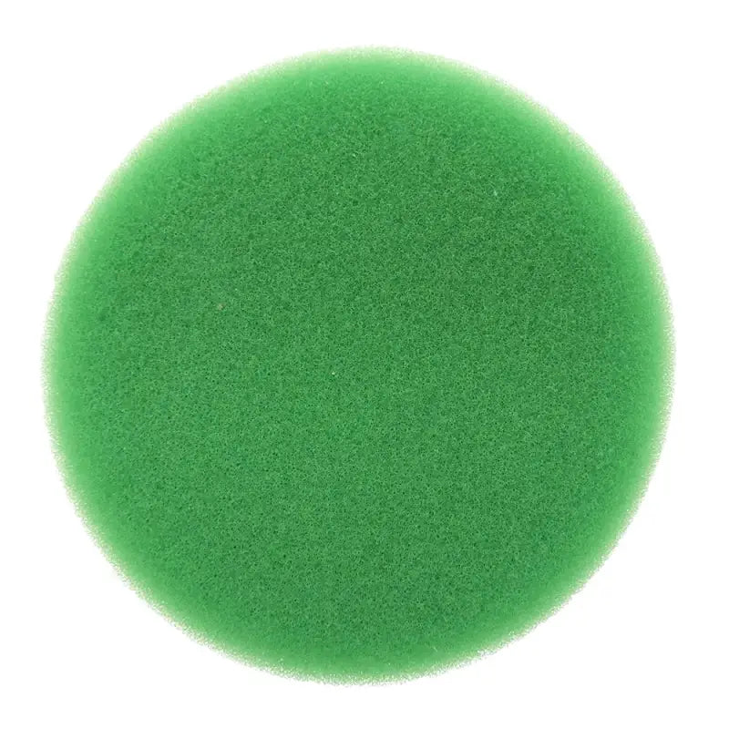 a green colored substance on a white background